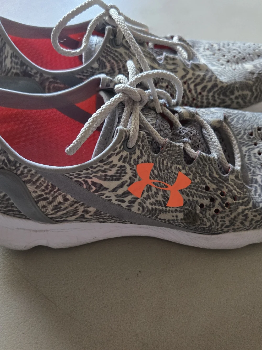 Under Armour Women's Gray Athletic Sneakers with Orange Logo Accent